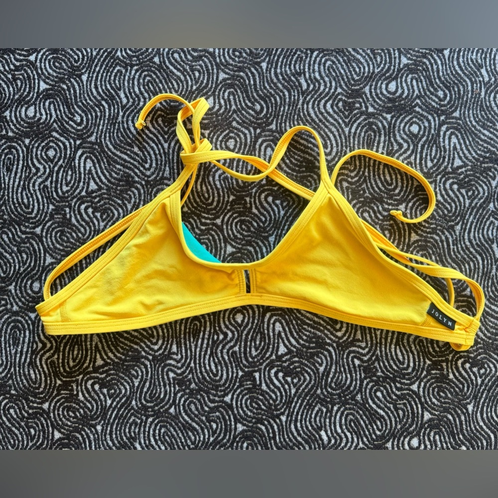 Jolyn Triangle bikini swim top, size small. Mango color. Criss-cross tie back.